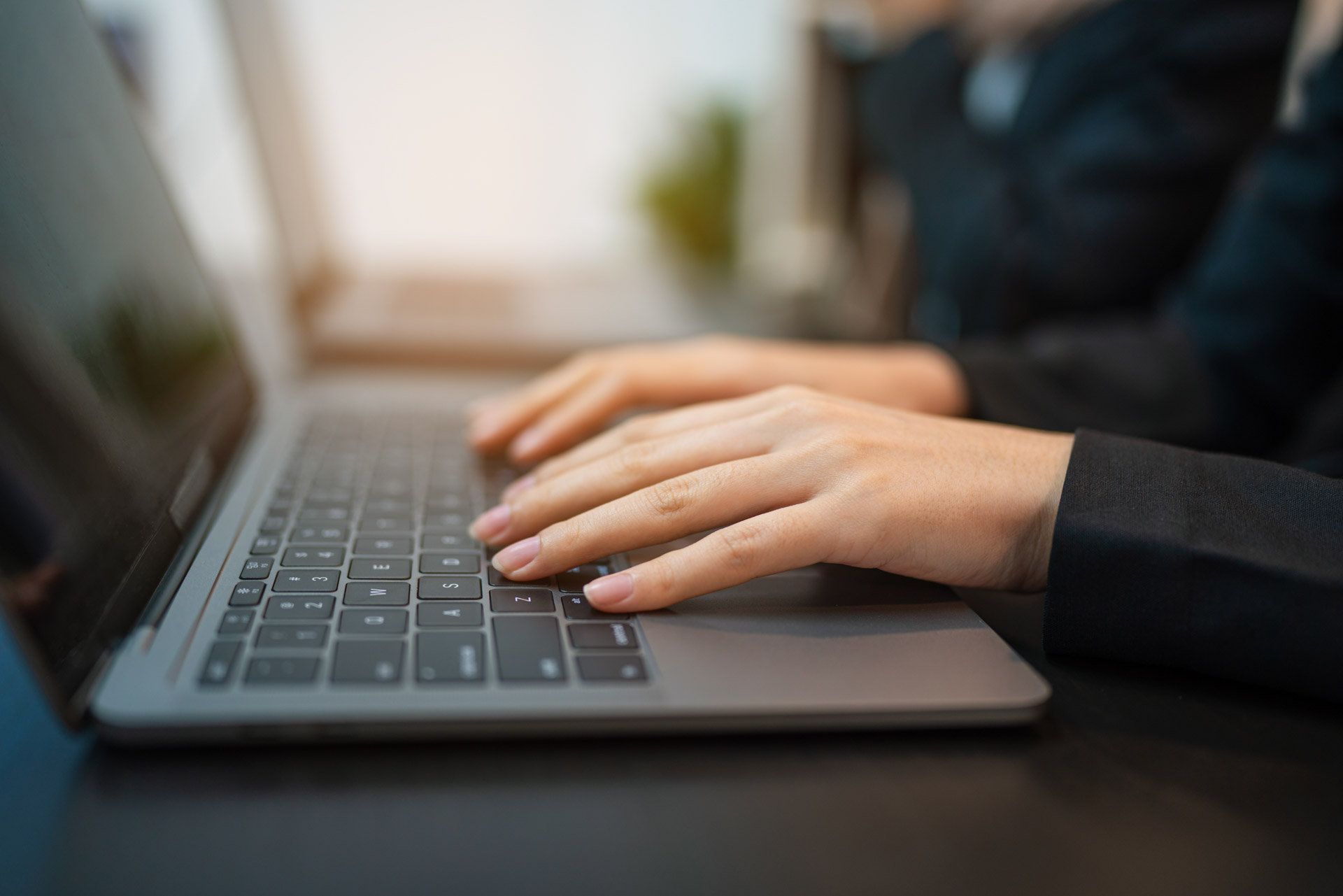 Person working on a laptop